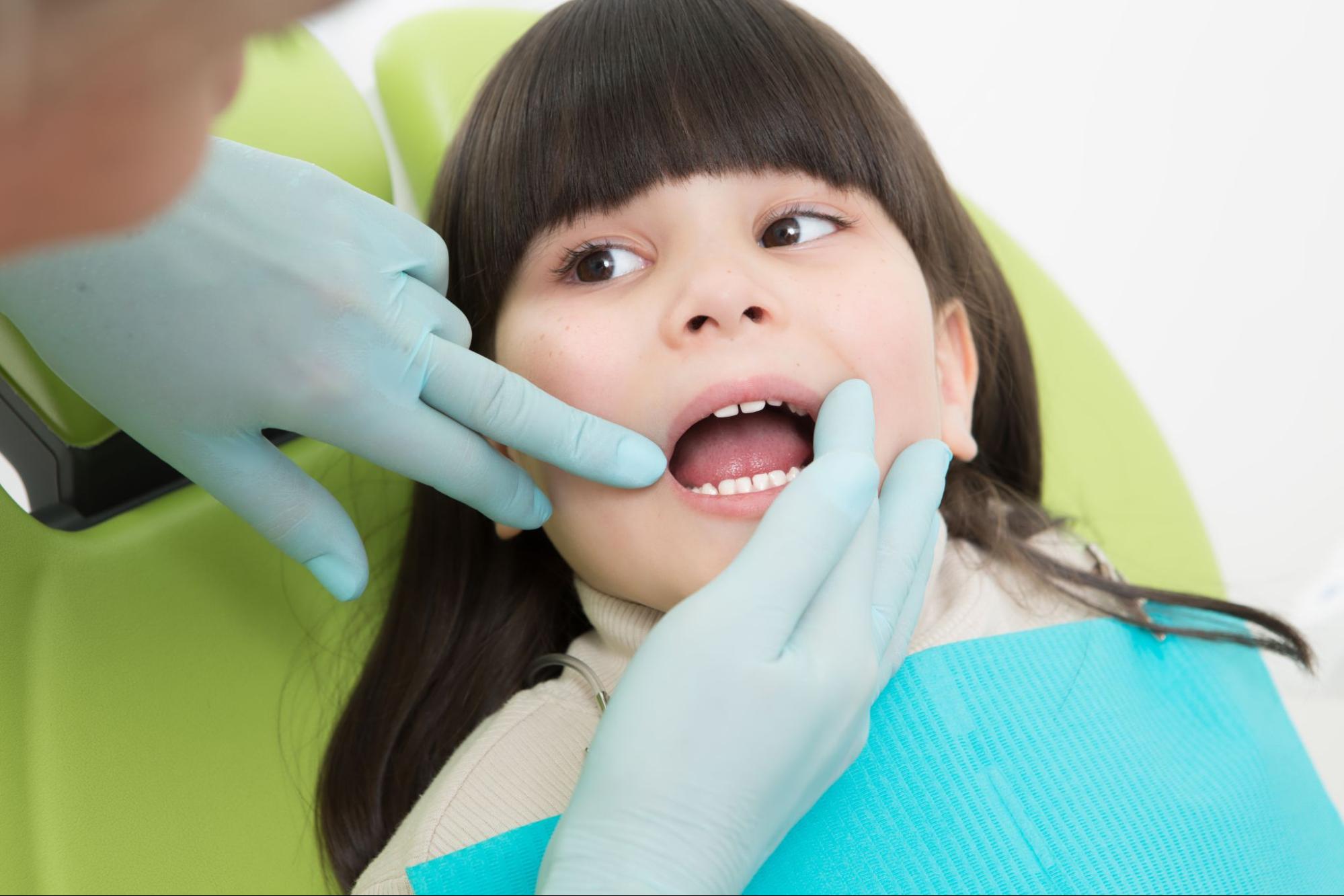 a girl at the dentist